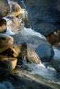 Close up of water running over rocks Royalty Free Stock Photo