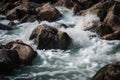 close-up of water rushing over rocks and into pool Royalty Free Stock Photo