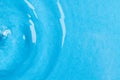 Close up of water with waves and ripples and copy space on blue background Royalty Free Stock Photo