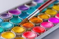 Close-up of watercolor paints on palette Ai photo Royalty Free Stock Photo