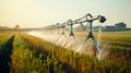 Close up of watering system in the field. An irrigation pivot watering a field