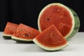 Close-up watermelon on concrete table and black color background Royalty Free Stock Photo