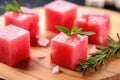 close-up of watermelon cubes beside crumbled feta cheese Royalty Free Stock Photo