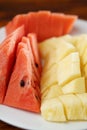 Slice of watermelon and pineapple on the plate. Royalty Free Stock Photo