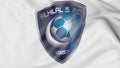Close-up of waving flag with Al Hilal FC football club logo, 3D rendering