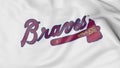 Close-up of waving flag with Atlanta Braves MLB baseball team logo, 3D rendering Royalty Free Stock Photo