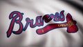 Close-up of waving flag with Atlanta Braves MLB baseball team logo, seamless loop. Editorial animation Royalty Free Stock Photo