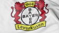 Close-up of waving flag with Bayer Leverkusen football club logo, 3D rendering