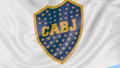 Close-up of waving flag with Boca Juniors football club logo, seamless loop, blue background. Editorial animation. 4K