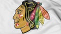 Close-up of waving flag with Chicago Blackhawks NHL hockey team logo, 3D rendering Royalty Free Stock Photo