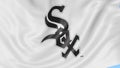 Close-up of waving flag with Chicago White Sox MLB baseball team logo, seamless loop, blue background. Editorial