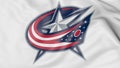 Close-up of waving flag with Columbus Blue Jackets NHL hockey team logo, 3D rendering