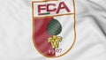 Close-up of waving flag with FC Augsburg football club logo, 3D rendering