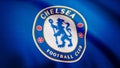 Close-up of waving flag with FC Chelsea football club logo, seamless loop. Editorial animation