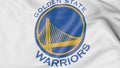 Close-up of waving flag with Golden State Warriors NBA basketball team logo, 3D rendering