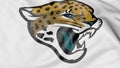 Close-up of waving flag with Jacksonville Jaguars NFL American football team logo, 3D rendering