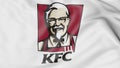 Close-up of waving flag with Kentucky Fried Chicken KFC logo, editorial 3D rendering