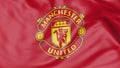 Close-up of waving flag with Manchester United F.C. football club logo