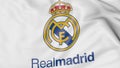 Close-up of waving flag with Real Madrid C.F. football club logo