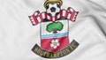 Close-up of waving flag with Southampton F.C football club logo, 3D rendering