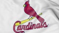 Close-up of waving flag with St. Louis Cardinals MLB baseball team logo, 3D rendering