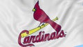 Close-up of waving flag with St. Louis Cardinals MLB baseball team logo, seamless loop, blue background. Editorial