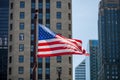 Close up of waving flag of the United States in downtown Chicago