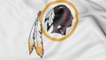 Close-up of waving flag with Washington Redskins NFL American football team logo, 3D rendering Royalty Free Stock Photo