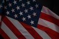 Close up of waving national usa american flag on black background with copy space Royalty Free Stock Photo