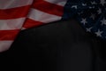 Close up of waving national usa american flag on black background with copy space Royalty Free Stock Photo