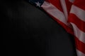 Close up of waving national usa american flag on black background with copy space Royalty Free Stock Photo