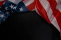 Close up of waving national usa american flag on black background with copy space Royalty Free Stock Photo