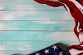 Close up of waving national usa american flag on wooden background Royalty Free Stock Photo