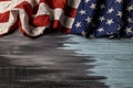 Close up of waving national usa american flag on wooden background Royalty Free Stock Photo