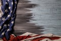 Close up of waving national usa american flag on wooden background Royalty Free Stock Photo