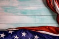 Close up of waving national usa american flag on wooden background Royalty Free Stock Photo