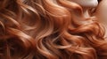 Close-up of the wavy red hair of a young woman