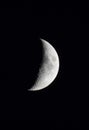 Crescent moon in a black night sky Royalty Free Stock Photo