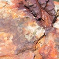 Close up weathered eroded rock at the beach pier