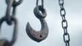 Rusty Metal Hook and Chain Links Hanging Outdoors, Heavy Duty Equipment for Lifting and Rigging Royalty Free Stock Photo