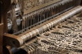 close-up of weaving machine, showing intricate and delicate patterns