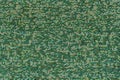 Close-up of weaving synthetic fiber threads in green fabric, abstract background, blank pattern Royalty Free Stock Photo