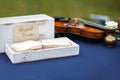 Close up of wedding guest book and violin on the table Royalty Free Stock Photo