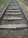 Close-up of railroad with wooden railroad sleepers Royalty Free Stock Photo