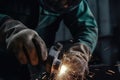 Close up of a welder using a grinder to cut metal, Industrial worker hands closeup view welding mettle, AI Generated