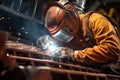 close-up of a welder at work on a ships hull