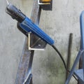 Close-up of Welding Electrode Holder on Metal Frame During Stair Construction Royalty Free Stock Photo