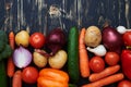 Close-up Of Well-arranged Vegetables Lying Over Wretched Background