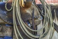 Close up of a western saddle with a rope for cattle. Royalty Free Stock Photo