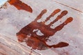 Wet handprint on a wooden landing stage Royalty Free Stock Photo